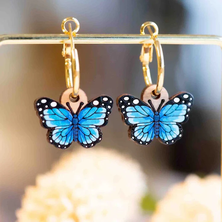 Blue butterfly hoop earrings - Image 2